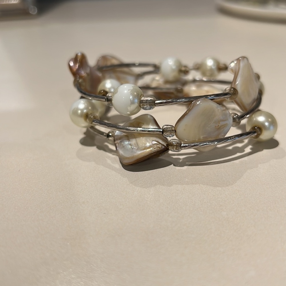 Beautiful multi strand wrap bracelet with mother of pearl beads and stones